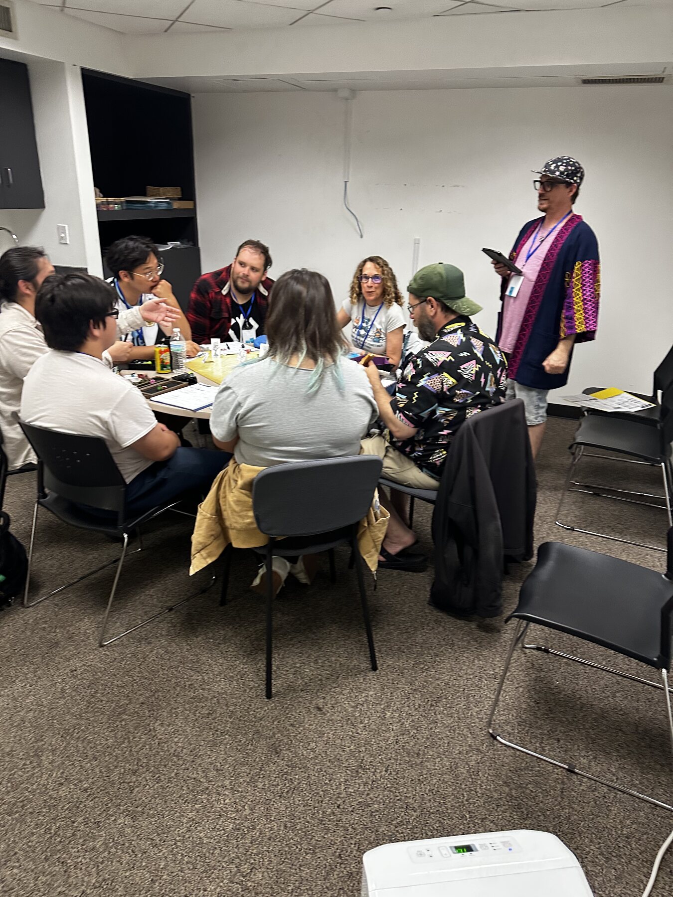 Game Master leading a table at Mighty Deeds Summer 2026