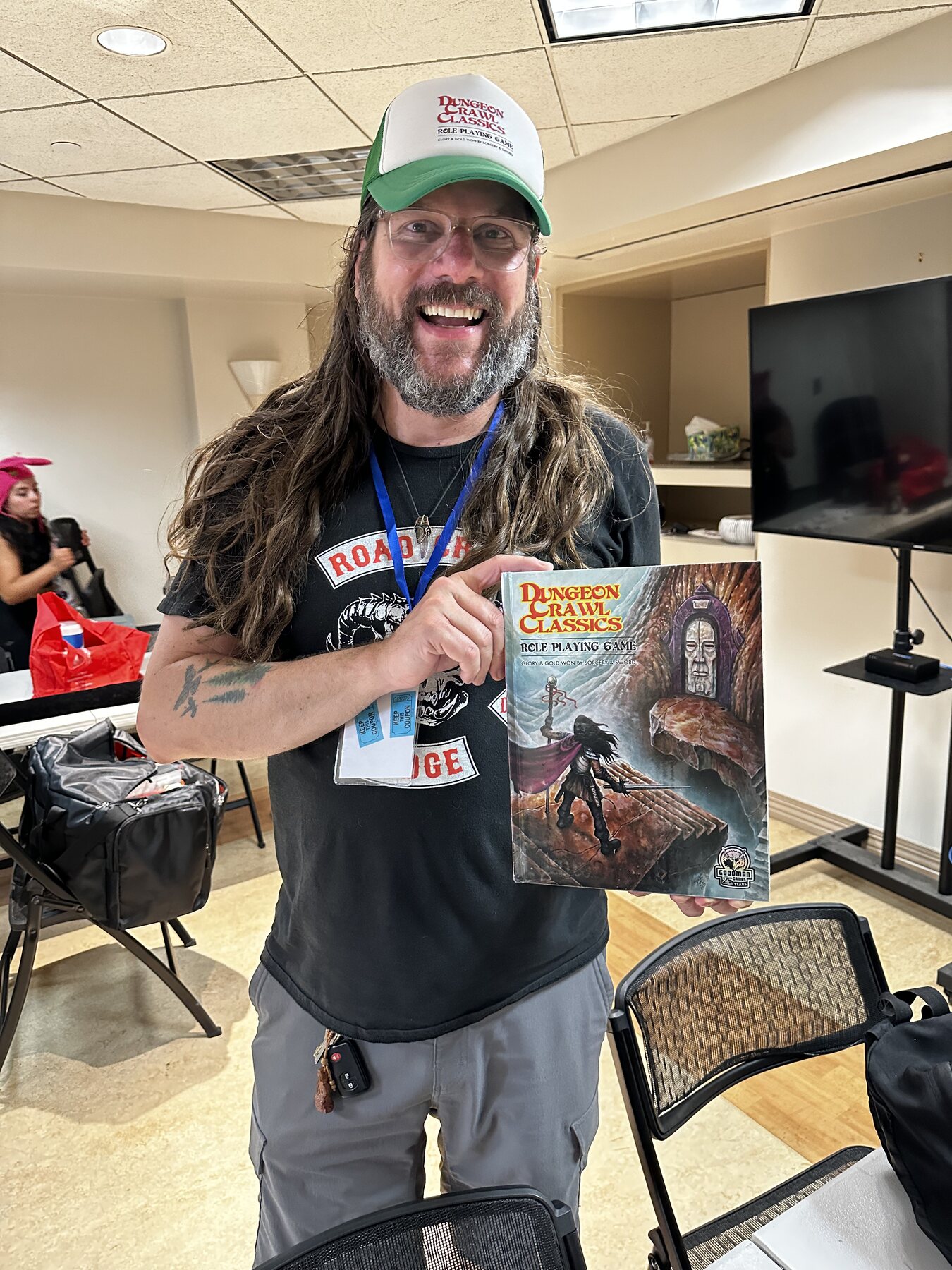 A Mighty Deeds participant holding a prize
