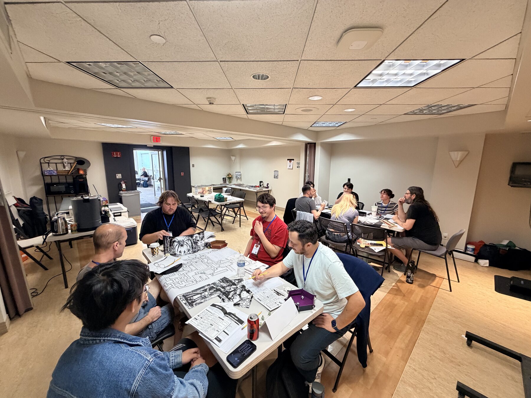 Players gathered at Mighty Deeds Summer 2026 gaming tables